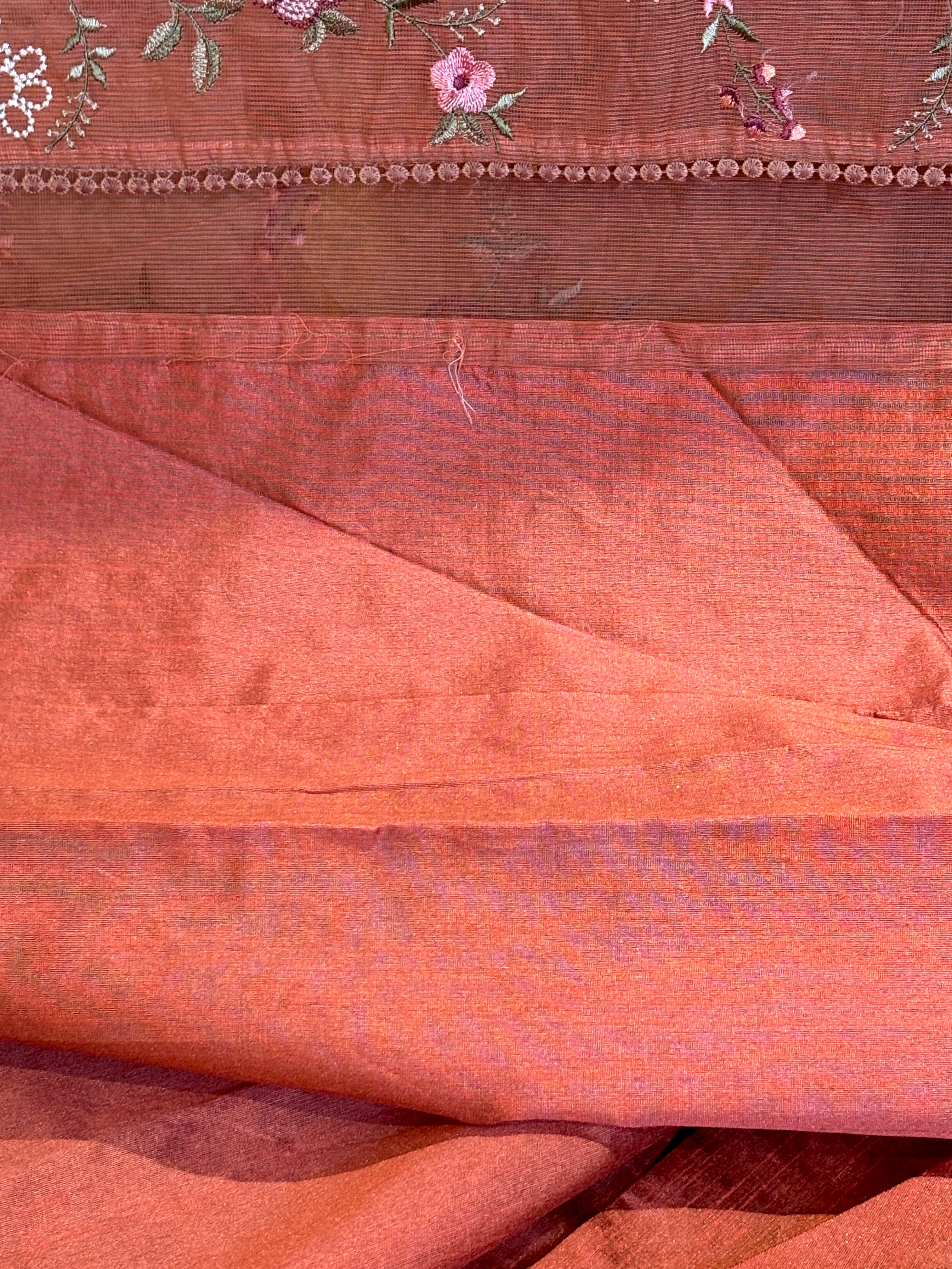 Floral embroidered rust Supernet saree