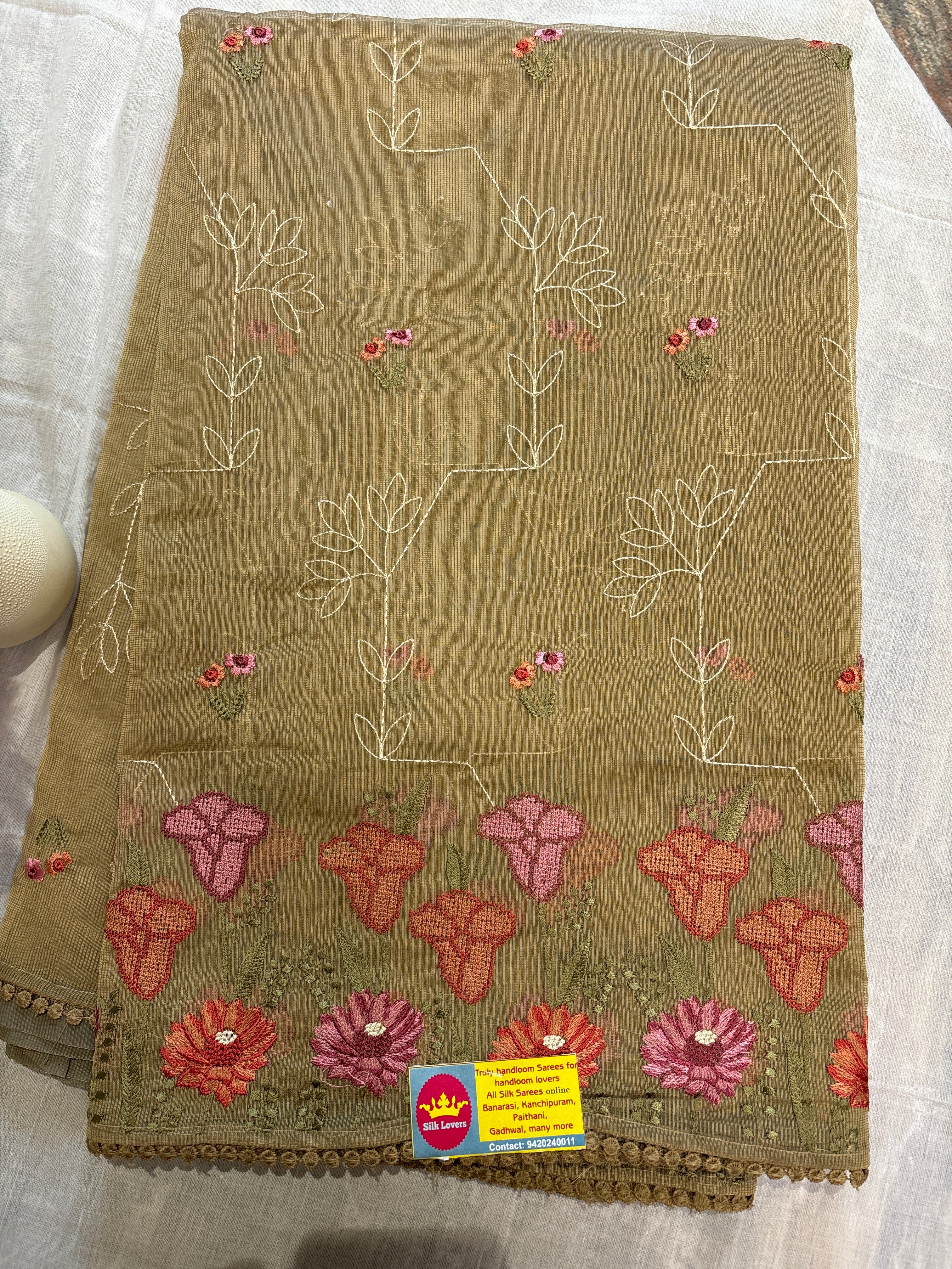 Tulip flower embroidery supernet saree .