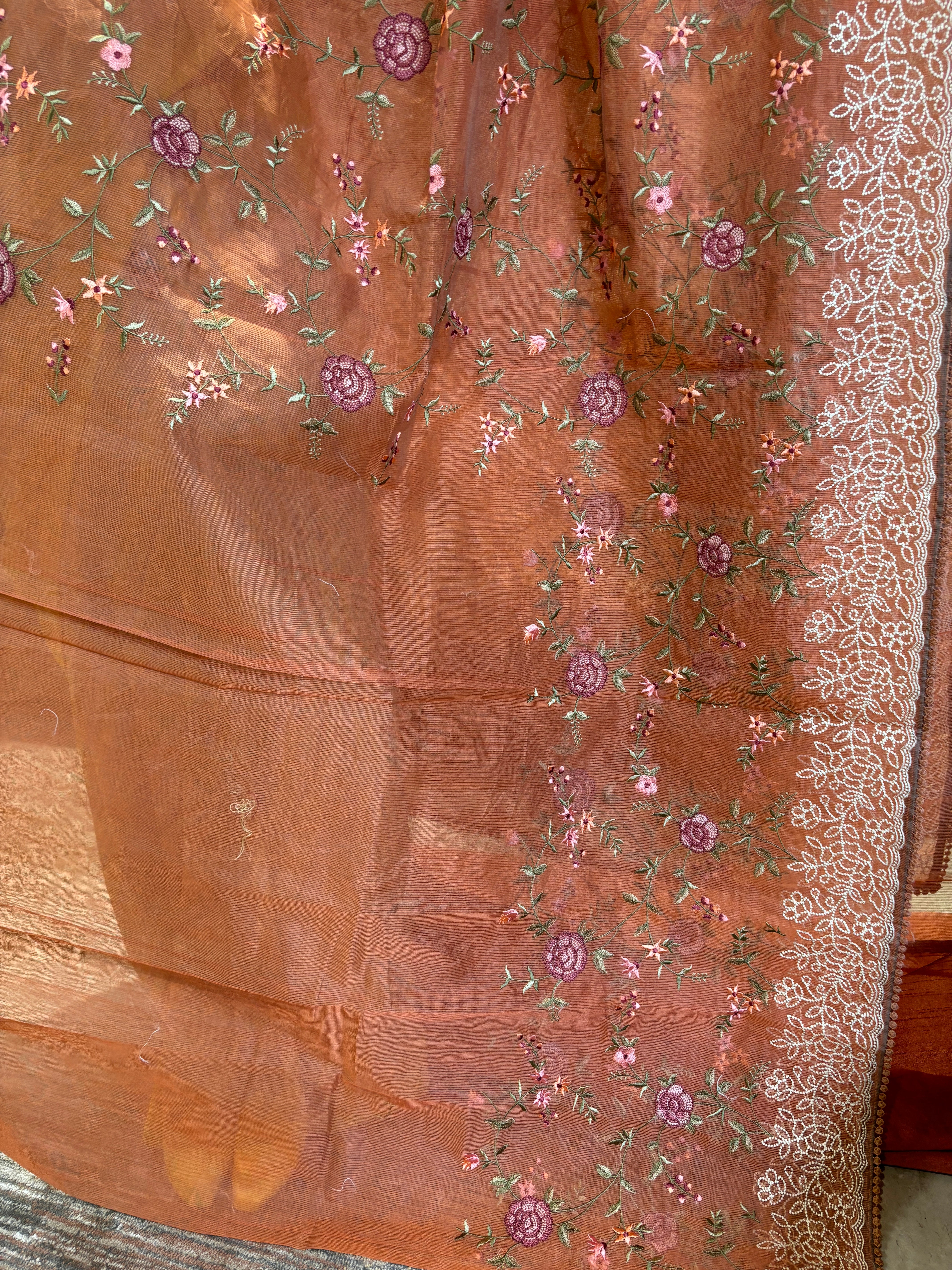 Floral embroidered rust Supernet saree